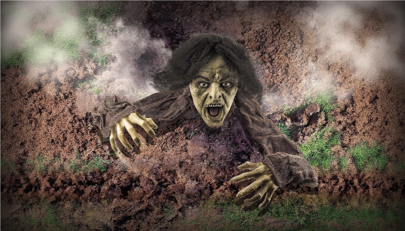 Zombie emerging from the ground.